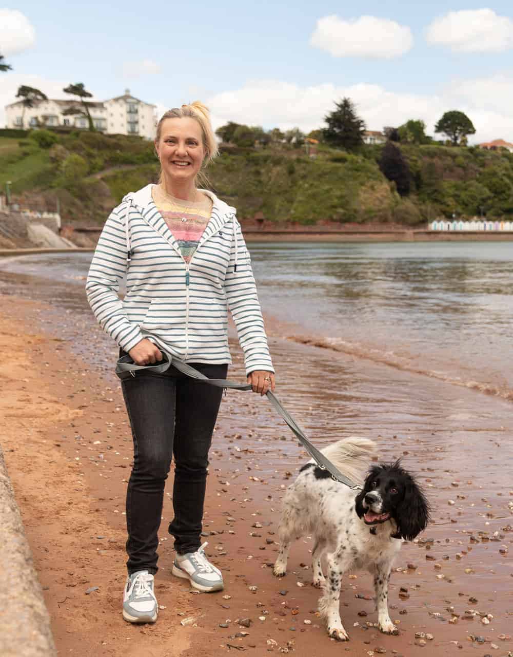 Fiona Pedley at the beach with Kensi the dog